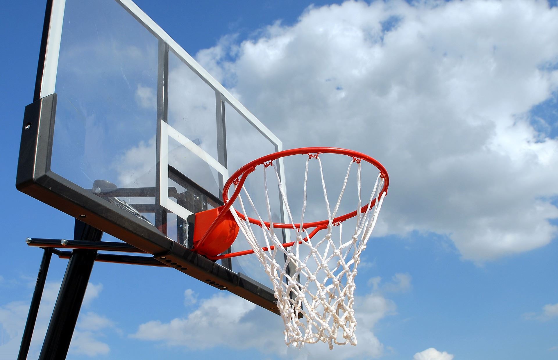 An outdoor basketball net. 