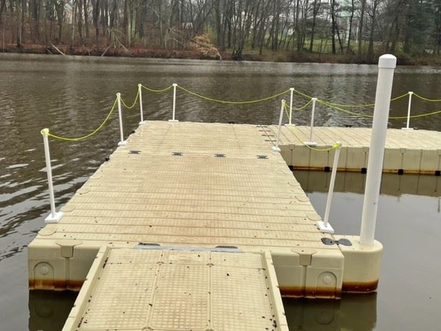 A photo of the floating dock at Strawbridge Lake. 