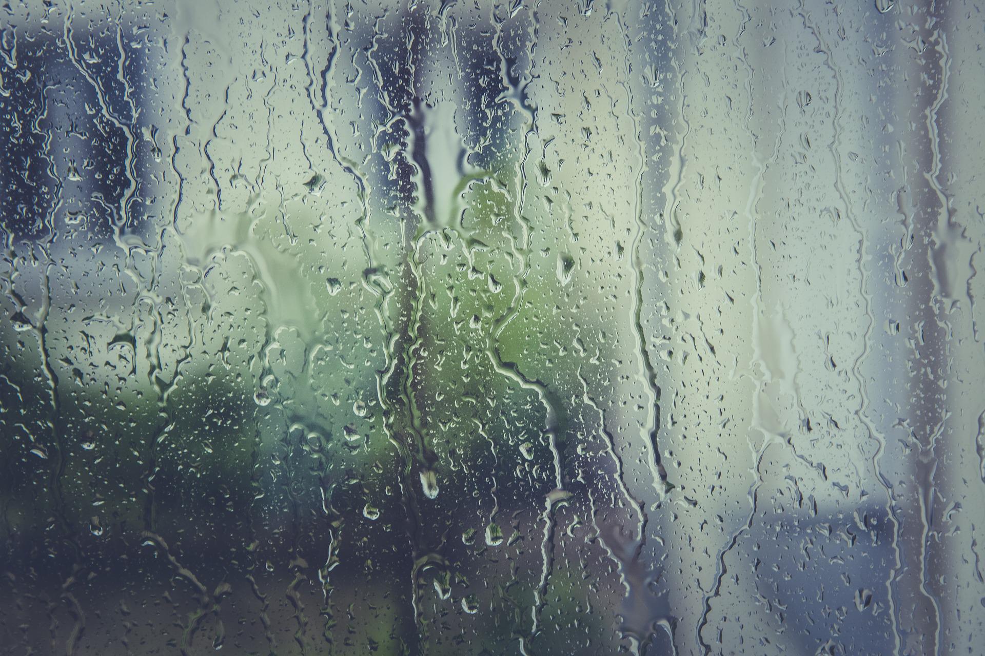 A rain spattered window. 